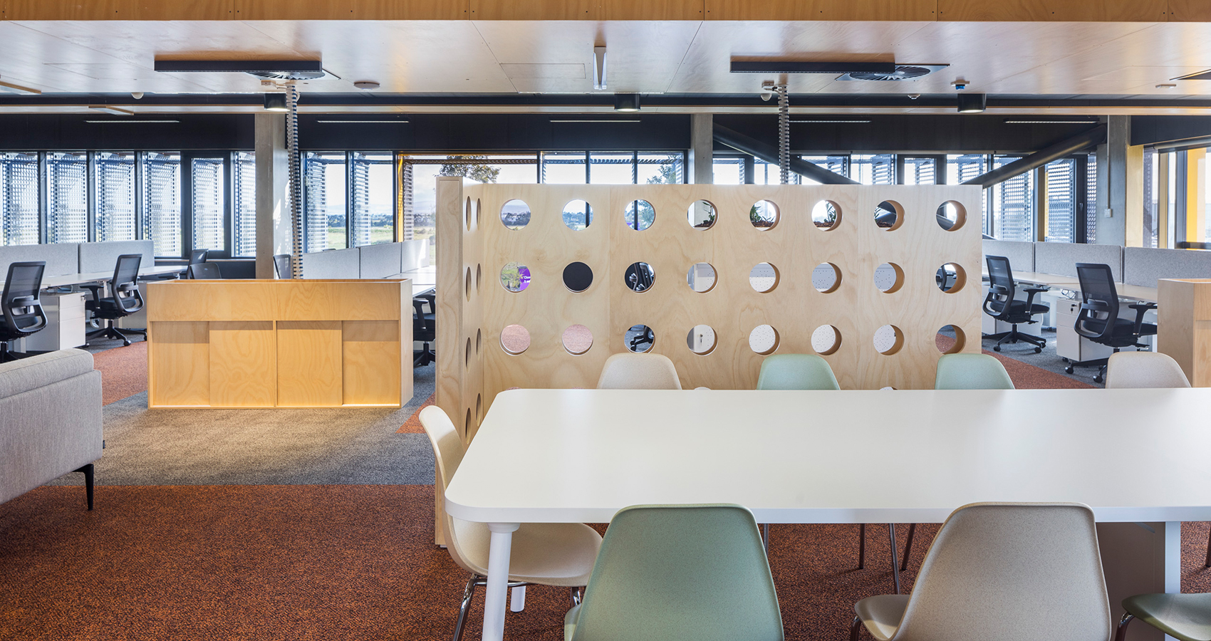 Mac Killop Family Services Project - Elki table and Inc chairs lunch setting in front of open office