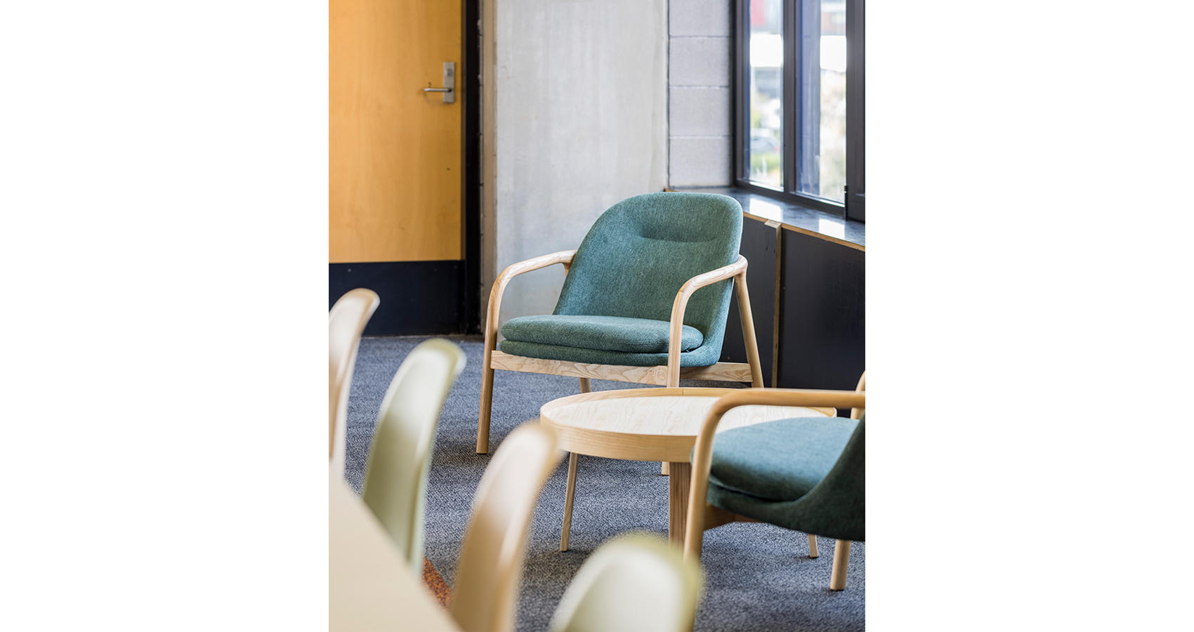 Mac Killop Family Services Project - Green Arlo chairs and Nest coffee table