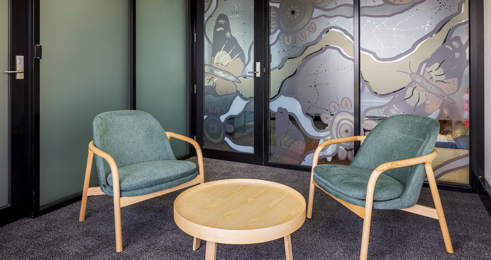 Mac Killop Family Services Project - Green Arlo chairs and Nest coffee table